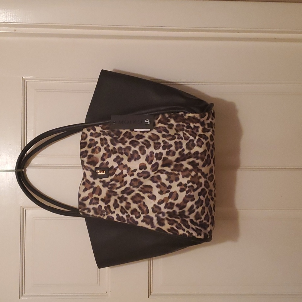 Moeko un billion tote.tan brown black animal print.